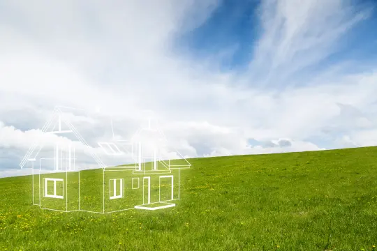 Bilde av et tegnet hus på ei eng.